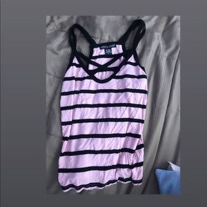 Pink and black tanktop with a criss cross 😘